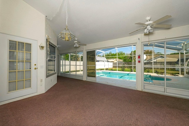 2717 Bayview Dr, Eustis, FL 32726 - unfurnished sunroom with a ceiling fan and a pool