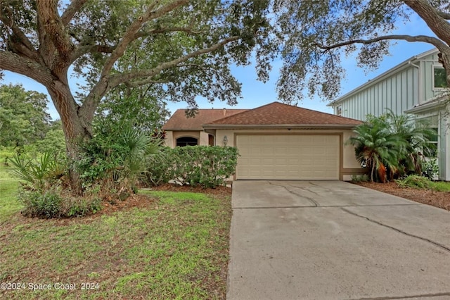 view of front of property featuring a garage