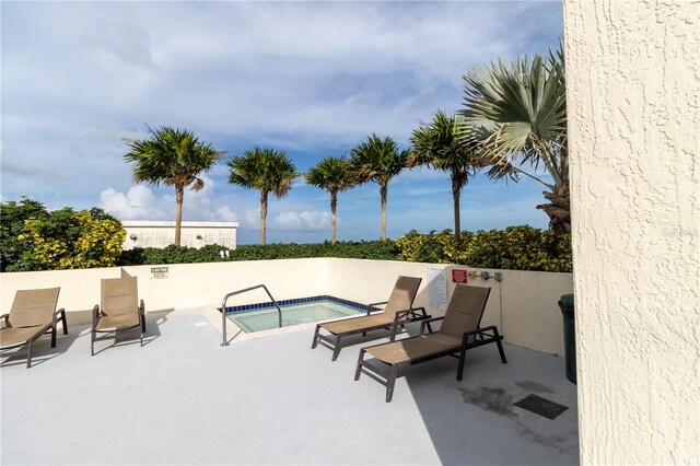 view of patio featuring a pool