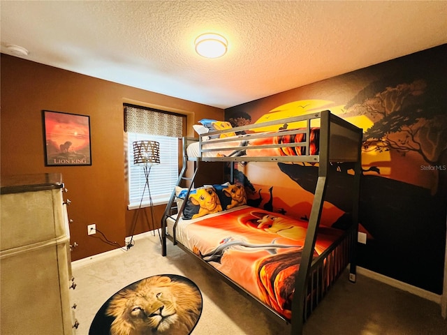 carpeted bedroom with a textured ceiling