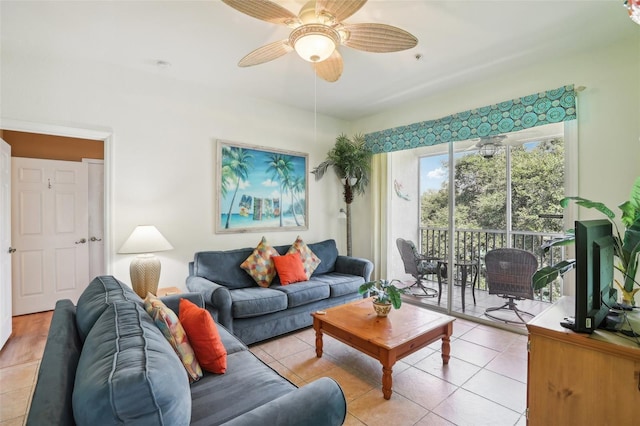 tiled living room with ceiling fan