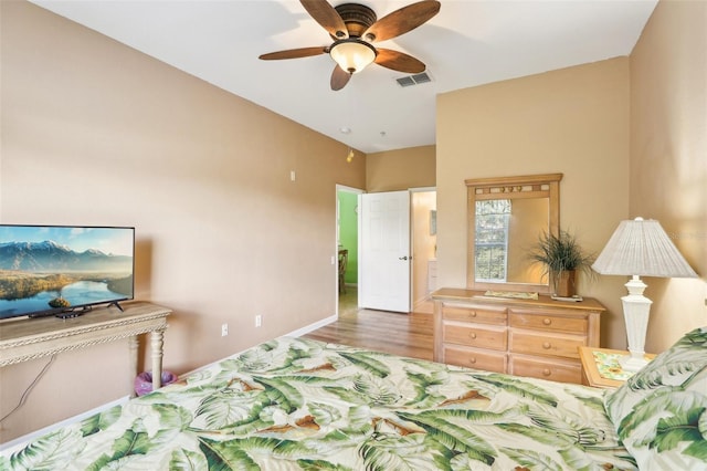 bedroom featuring ceiling fan and hardwood / wood-style flooring