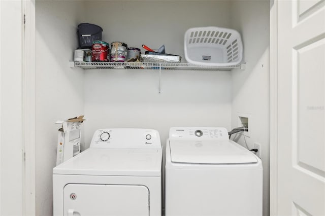 laundry area with washer and clothes dryer