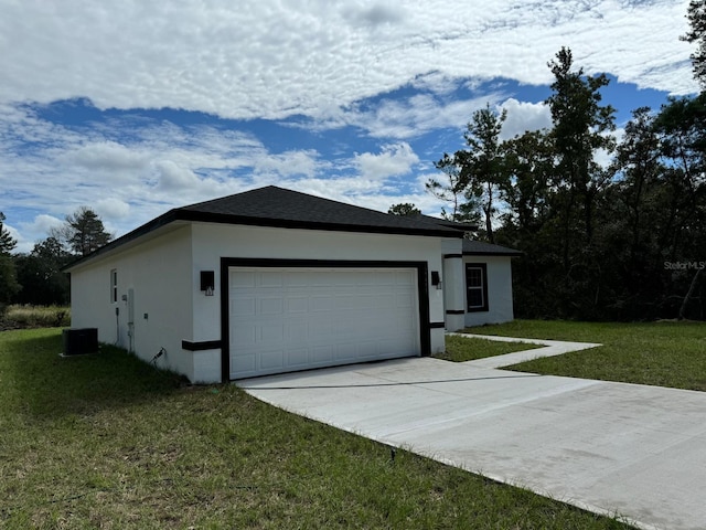 view of front of home with a garage, a front lawn, and central air condition unit