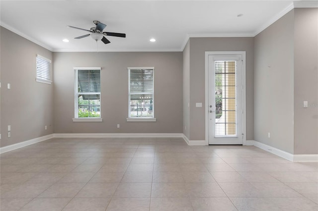 empty room with light tile patterned flooring, ornamental molding, and ceiling fan