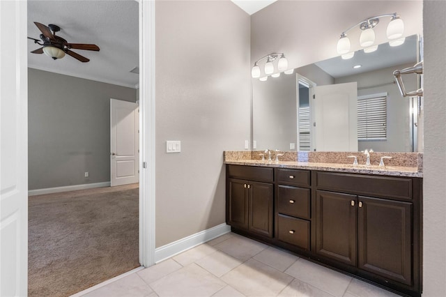 bathroom with ceiling fan, vanity, and tile patterned floors