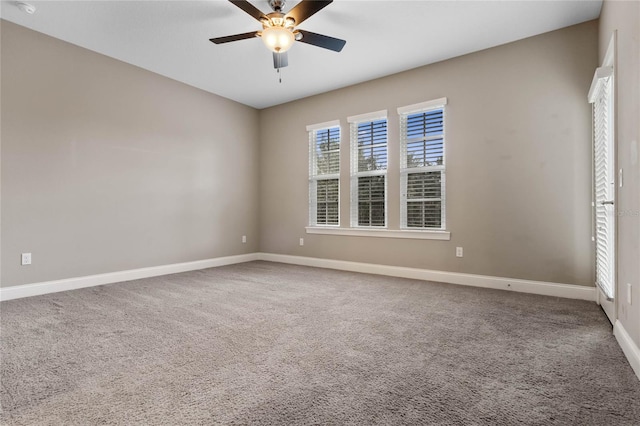 carpeted empty room with ceiling fan