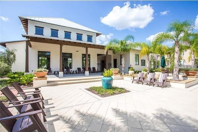 rear view of house featuring a patio area