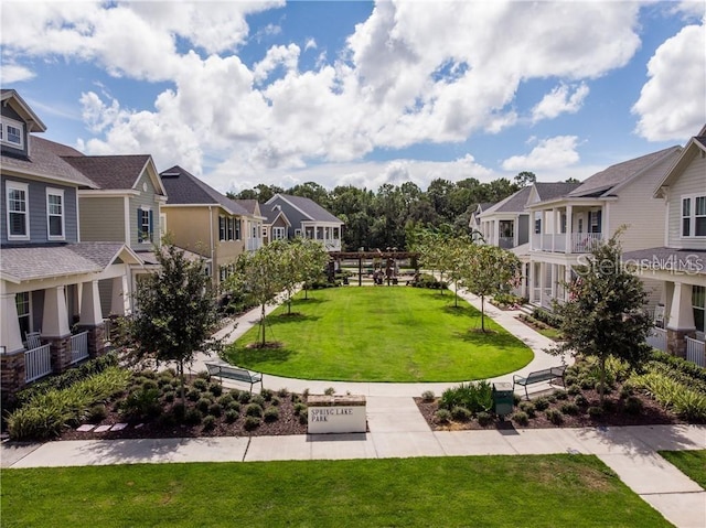 view of community featuring a yard