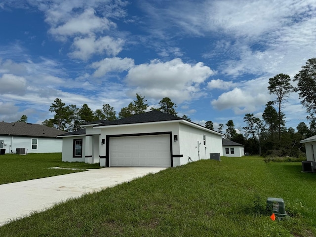 single story home with a front lawn, central AC unit, and a garage