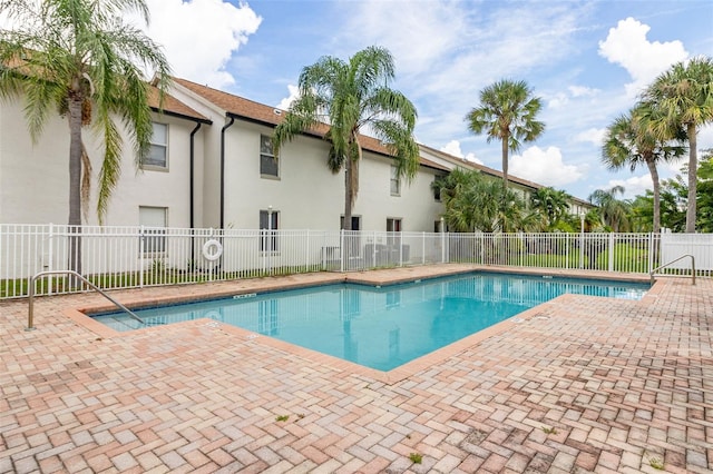 view of swimming pool featuring a patio