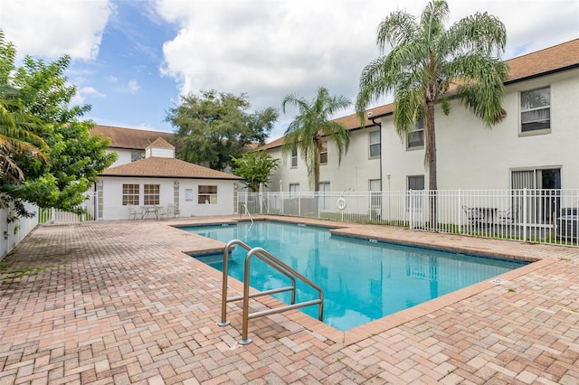 view of pool with a patio