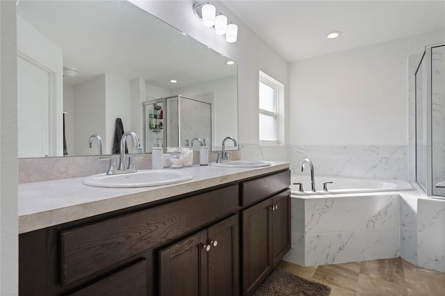 bathroom featuring vanity, plus walk in shower, and hardwood / wood-style flooring