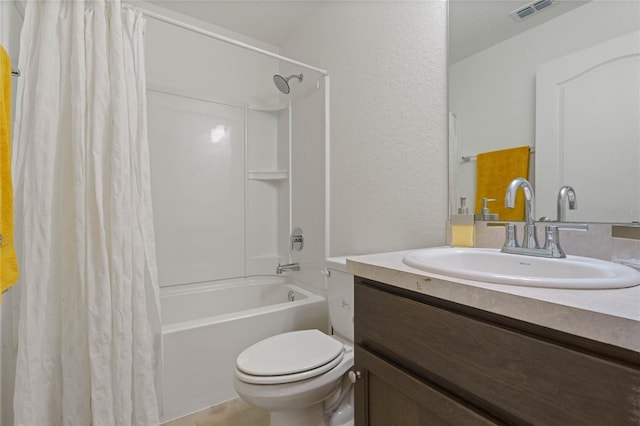 full bathroom with shower / bath combination with curtain, vanity, and toilet