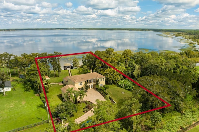 birds eye view of property featuring a water view