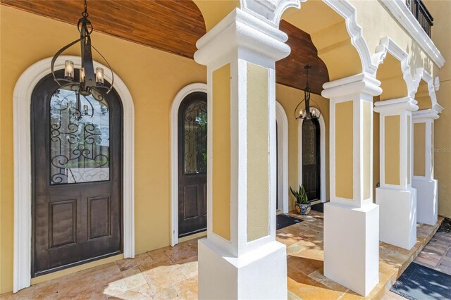 entrance to property featuring covered porch