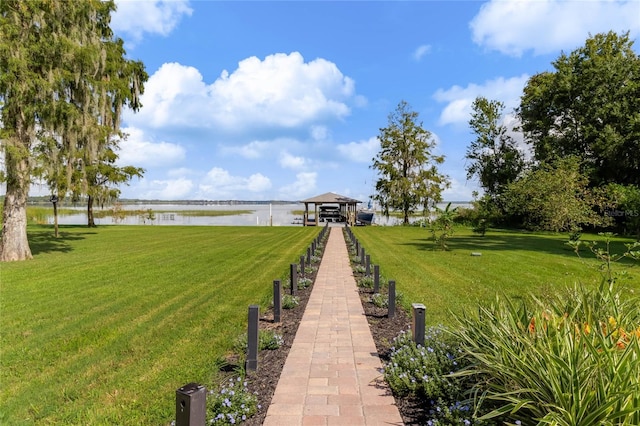 view of yard with a water view and a gazebo