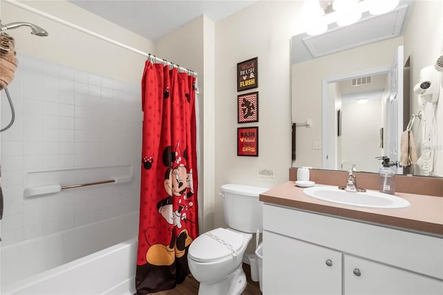 full bathroom featuring shower / bathtub combination with curtain, hardwood / wood-style floors, vanity, and toilet