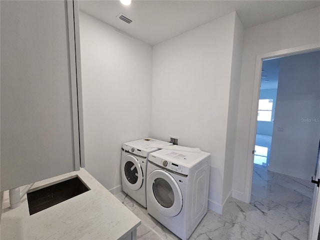 laundry area with washer and dryer