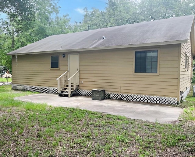 rear view of house featuring a patio