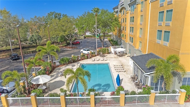 view of swimming pool with a patio area