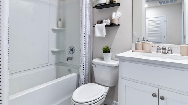 full bathroom with vanity, toilet, and shower / tub combo with curtain