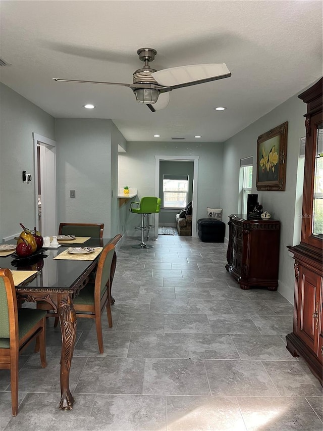 dining area featuring ceiling fan