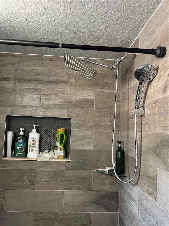 room details with a tile shower