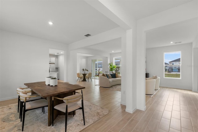 dining room featuring light hardwood / wood-style floors