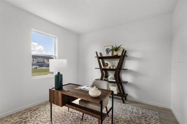 home office featuring hardwood / wood-style floors