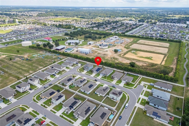220 Bergamot Loop, Davenport, FL 33837 - aerial overview of property's location with nearby suburban area