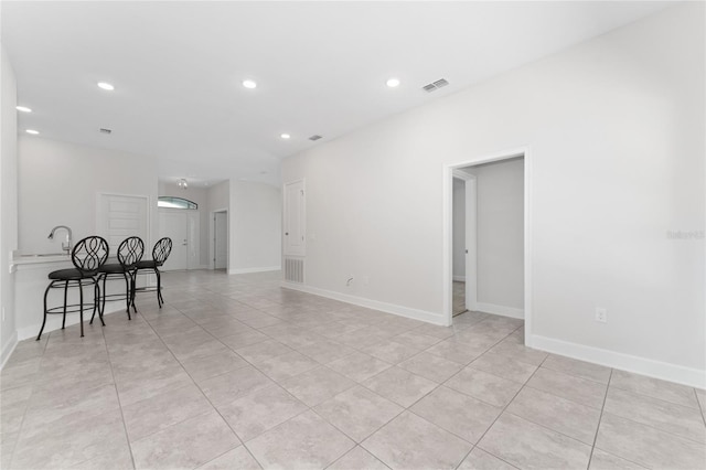 interior space featuring light tile patterned flooring