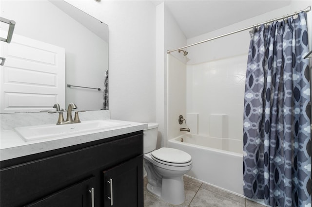 full bathroom featuring shower / bath combination with curtain, vanity, tile patterned flooring, and toilet