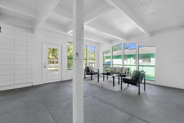 sunroom with beam ceiling