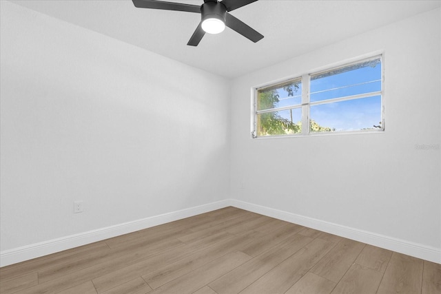 unfurnished room with light wood-type flooring and ceiling fan