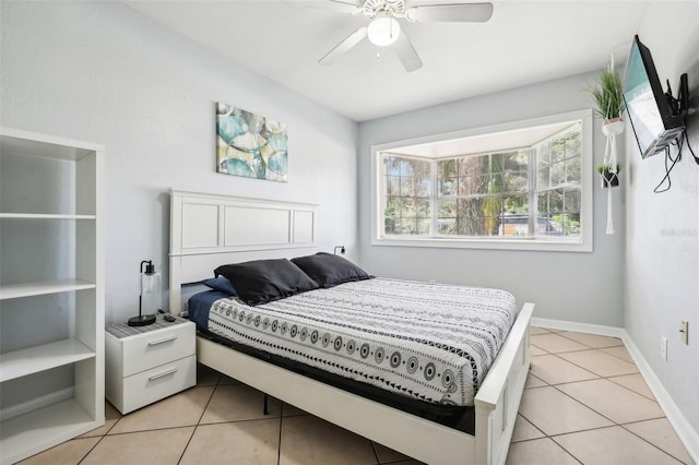 bedroom with light tile patterned floors and ceiling fan