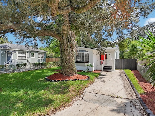 view of front of home with a front yard