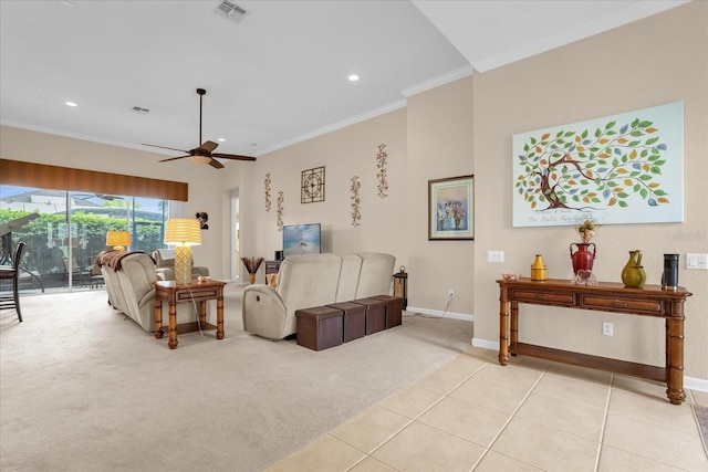 living room featuring crown molding, light colored carpet, and ceiling fan