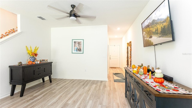 corridor featuring light hardwood / wood-style floors