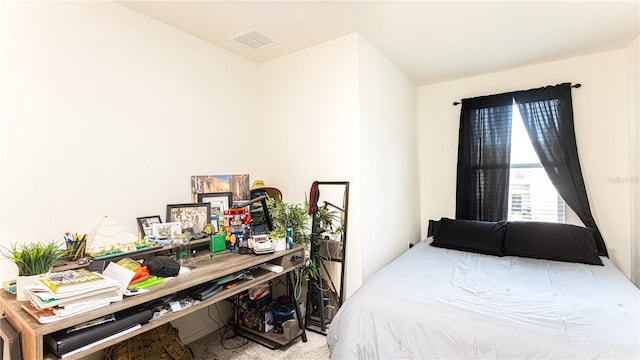 bedroom with light carpet