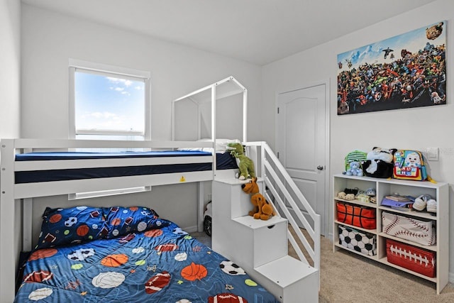 bedroom featuring light carpet