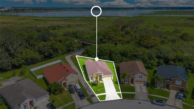 1033 Hacienda Cir, Kissimmee, FL 34741 - bird's eye view with a residential view and a water view