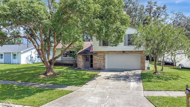 view of front of home with a garage and a front yard