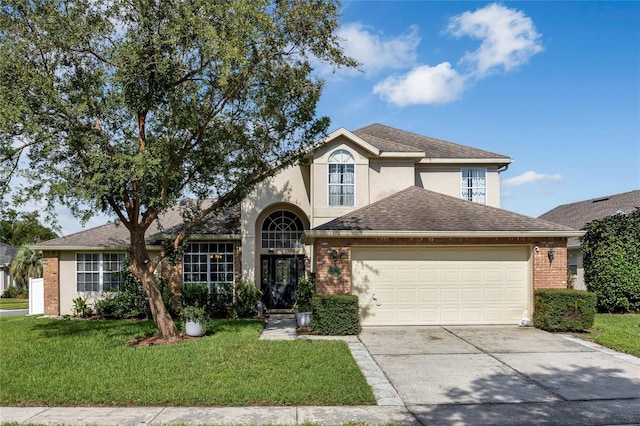 view of property featuring a front lawn