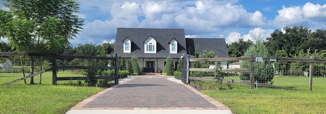 view of front of home with a front lawn