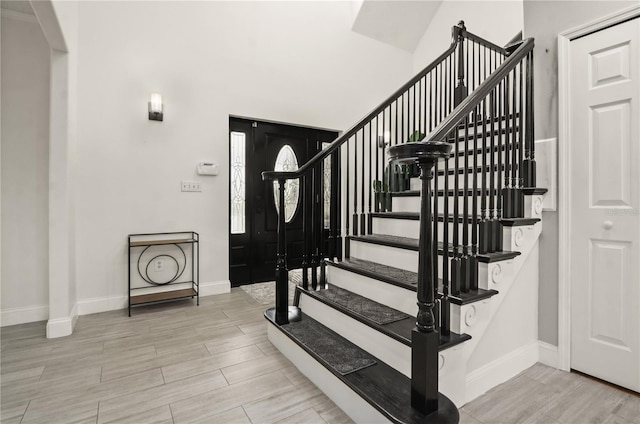 stairway with wood-type flooring