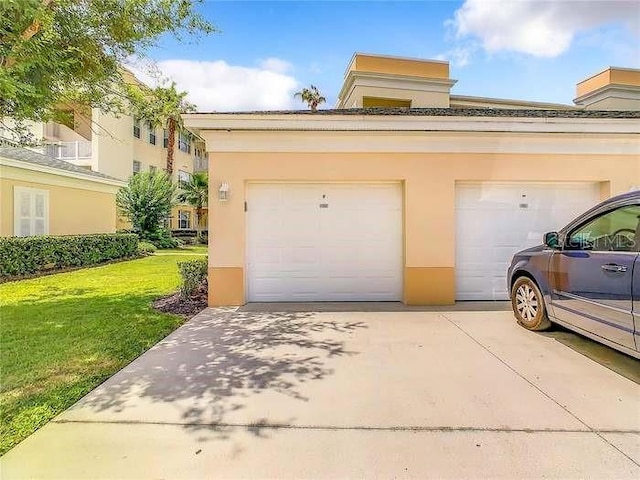 garage with a lawn