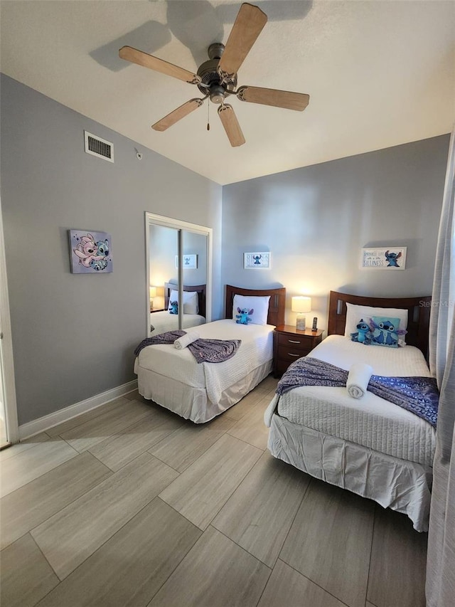 bedroom featuring ceiling fan