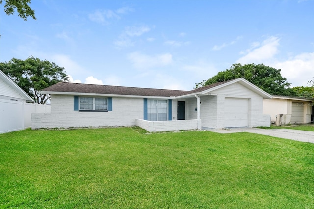 single story home featuring a garage and a front yard