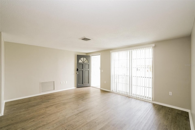 entrance foyer with hardwood / wood-style flooring